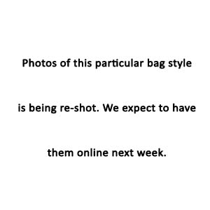 The Sturdy Calico Cotton Canvas Bag With Contrasting Trims And Handles